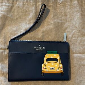 Kate Spade Black Wristlet with Yellow Car Design